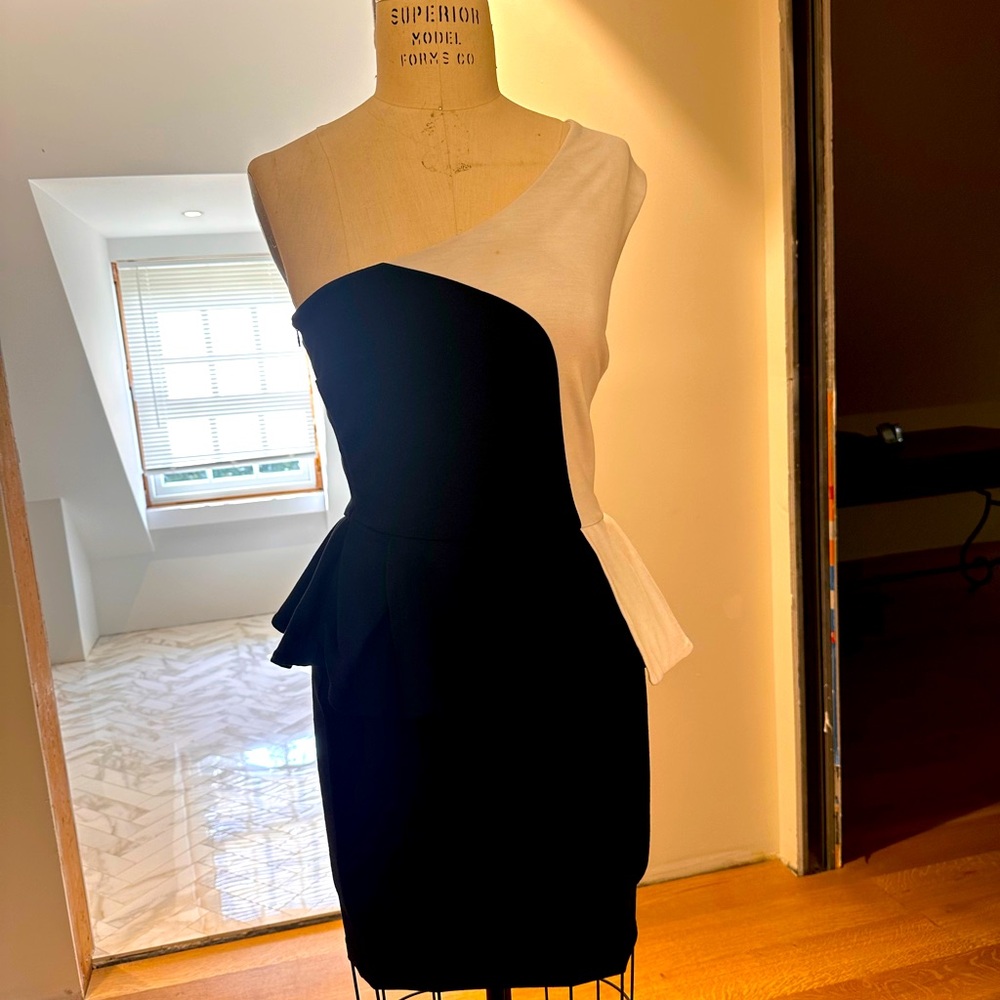 White and black peplum dress